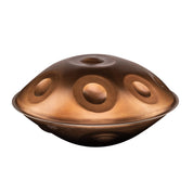 The MAG F# low pygmy 21 by Yatao // Shop is a metallic handpan drum with a dome shape and circular indentations, crafted in the signature style of Yatao, shown here isolated on a white background.