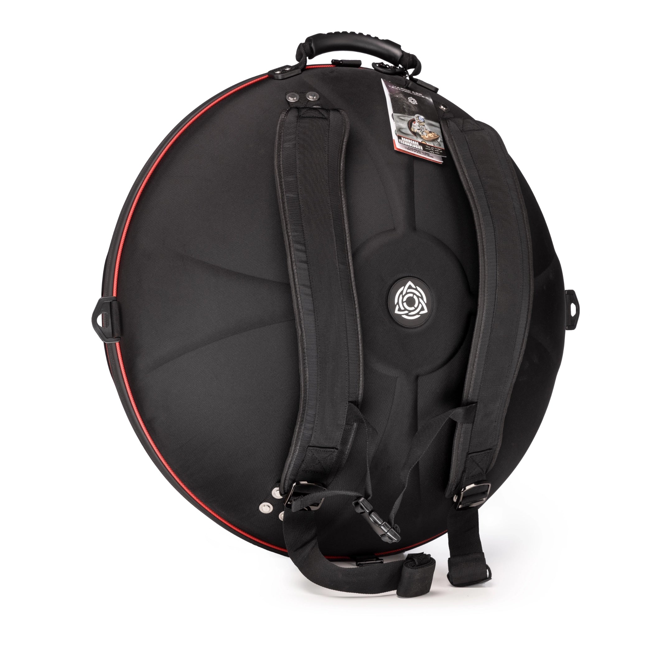 The TurtleCase Handpan Bag Evatek 2.0 medium HCT is a black, round case with backpack straps, a handle, central circular logo, red edge trim, and an attached product tag reflecting quality craftsmanship.