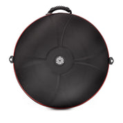 A round, black hard shell case with a center logo, red edge trim, textured top handle, and two side handles—made for carrying and protecting the MAG E Amara 20 handpan from Yatao // Shop.