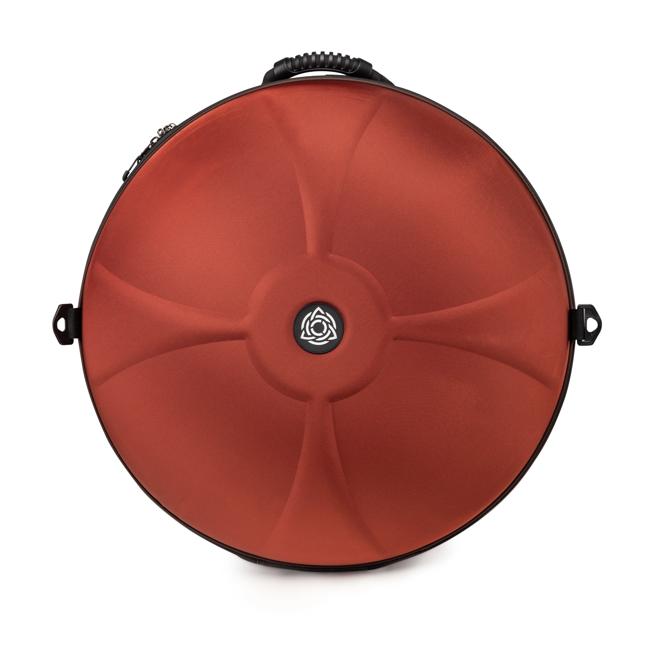 A round, rust-red hard case with black trim, a top handle, and a central black-and-white emblem—ideal for carrying the YataoPan D Kurd 13 Ember by Yatao // Shop or similar handpans; perfect for beginners.