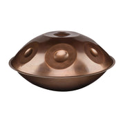 The YataoPan C# Pygmy 9 by Yatao // Shop is a metallic handpan drum with a dome shape and circular indentations, displayed on a white background in the signature Yatao style.