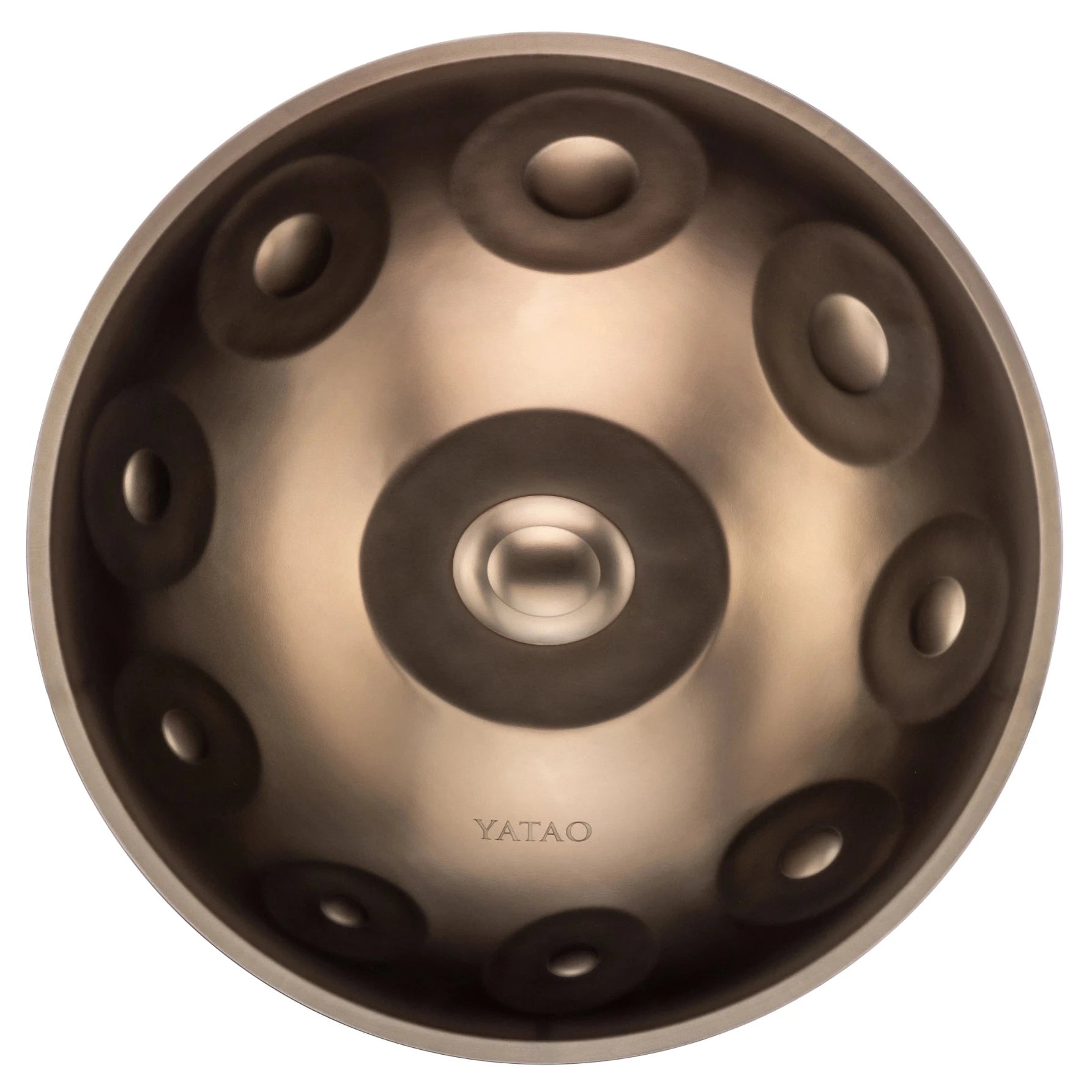 A metallic YataoPan D Kurd 13 handpan drum by Yatao // Shop is shown from above, featuring a central dome, circular indentations, and the brand name engraved near its smooth edge.