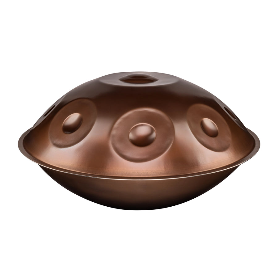 Yatao D Kurd 11 beginner handpan with 11 notes, bronze finish, side view, isolated on a white background.