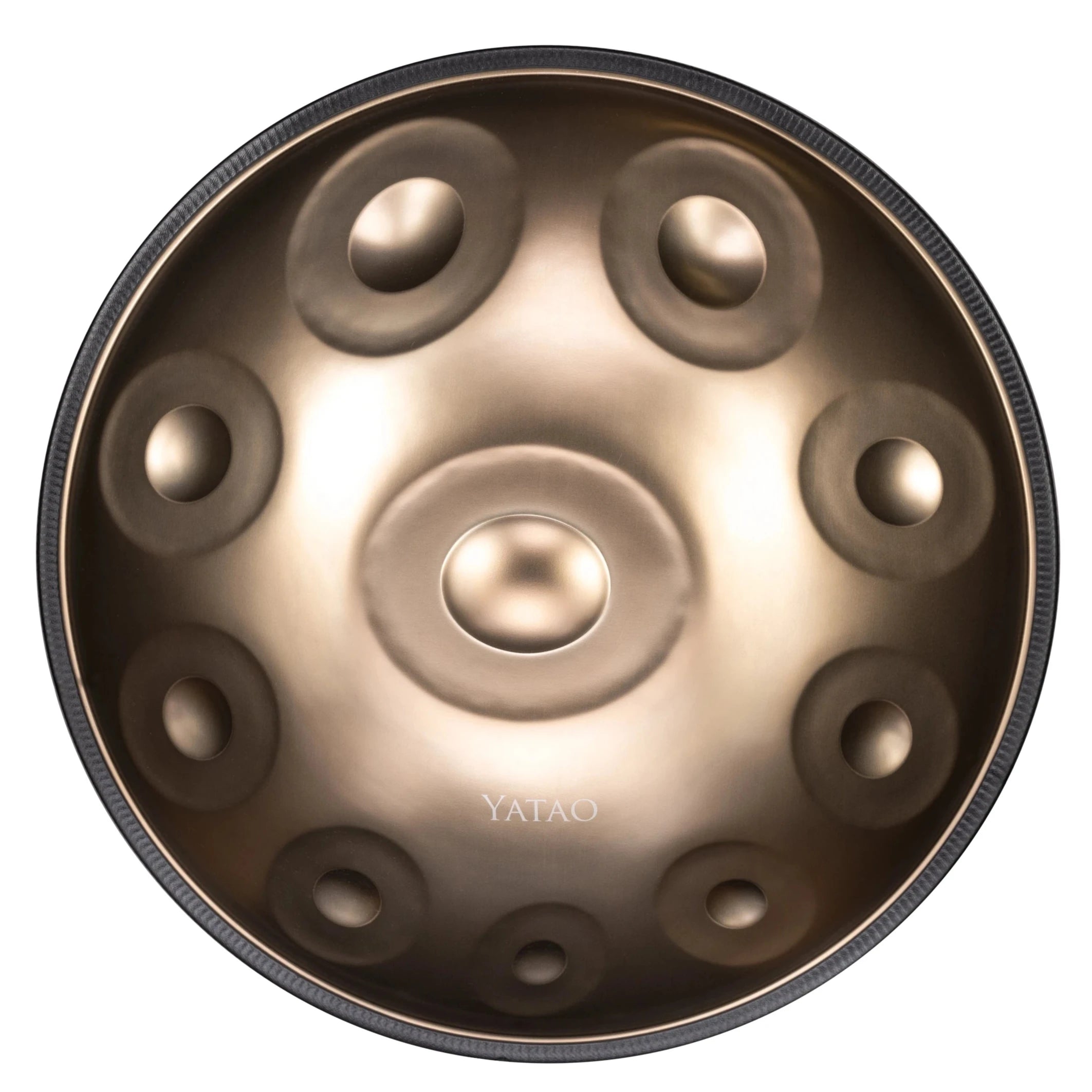  Shop features a smooth, round metallic surface with circular indentations and subtle bottom-center branding, as seen from above.